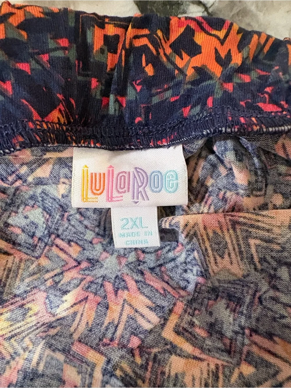 LuLaRoe Navy Skirt with Pink & Orange Burst Print